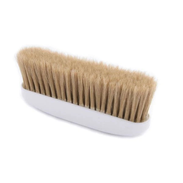 A small rectangular bench brush with light tan bristles and a white plastic handle, shown on a plain white background.