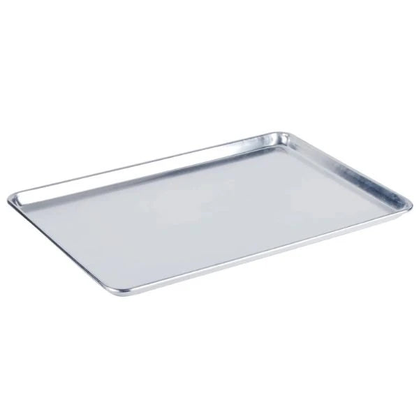 A rectangular stainless steel baking sheet with raised rimmed edges, shown at an angle on a plain white background.