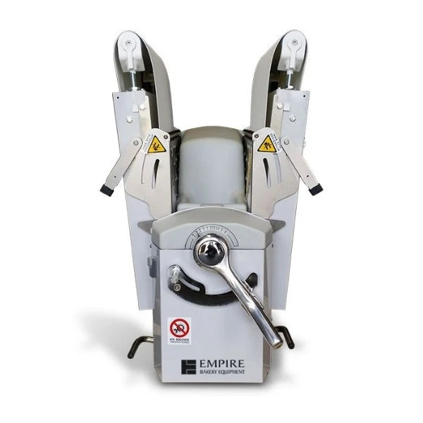 A tabletop dough sheeter machine with the tables folded up for easier storage. 