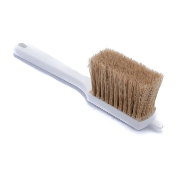 A small egg wash brush with a white plastic handle and natural tan bristles, shown on a plain white background.