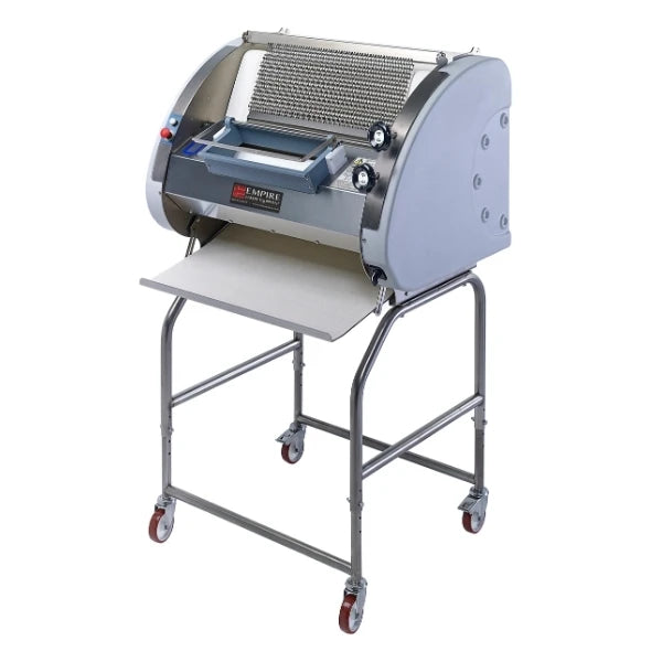 A commercial baguette moulding machine on a wheeled stand, featuring a silver stainless steel body, a gray side panel, and a gray folding table tray, shown against a plain white background.