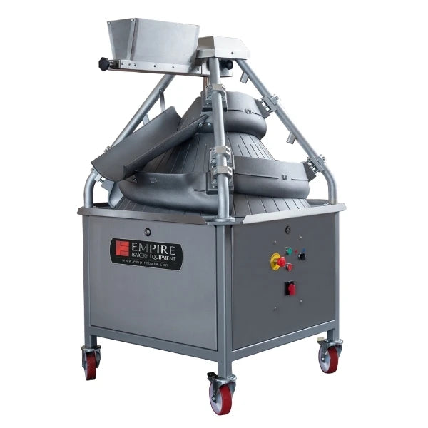 A large commercial conical rounding machine by Empire Bakery Equipment, featuring a gray metal body on a wheeled cart with red casters, a slotted hopper on top, and a metal support frame, shown against a plain white background.