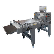 A commercial dough moulding machine with a stainless steel table, roller, and hopper, shown on a plain white background.