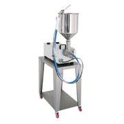 A stainless steel industrial filling machine mounted on a matching metal stand with casters, featuring a blue pneumatic hose and a white control box, isolated on a white background.