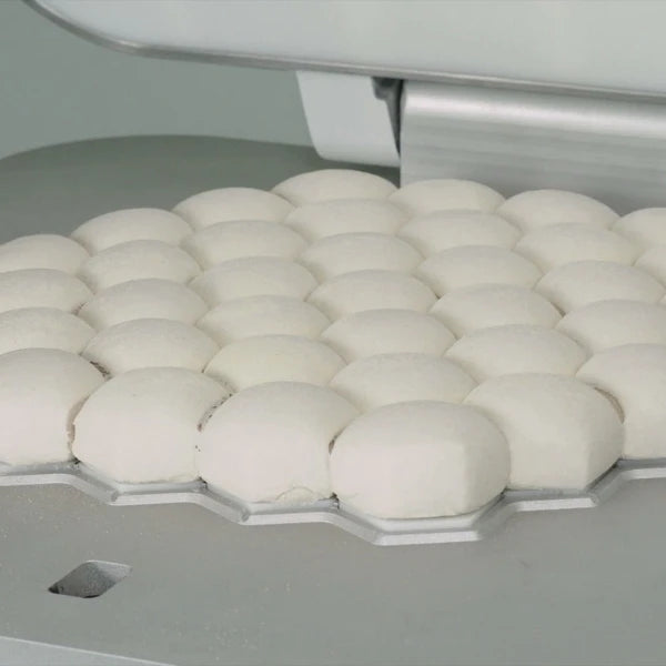 A close-up of the dough after it has been divided in the hexagonal divider. 