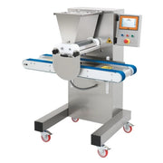 A stainless steel cookie depositing machine with a digital control panel, hopper, and caster wheels, shown on a white background.